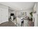 Bright living area with a fireplace, lots of natural light, and a comfortable seating area at 110 Bowen Sw Cir, Atlanta, GA 30315