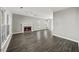 Spacious living room with large windows, a fireplace, and hardwood floors at 110 Bowen Sw Cir, Atlanta, GA 30315