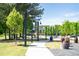 Outdoor area with a sidewalk, lights, and trees at 110 Bowen Sw Cir, Atlanta, GA 30315