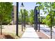 Green outdoor area with a sidewalk and trees at 110 Bowen Sw Cir, Atlanta, GA 30315