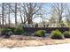 The entrance to the High Point Estates community with lush landscaping and a brick base at 110 Bowen Sw Cir, Atlanta, GA 30315