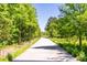 Tree-lined walking path provides a serene environment for residents to enjoy nature at 110 Bowen Sw Cir, Atlanta, GA 30315