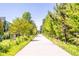 Picturesque walking path lined with mature trees, creating a peaceful and shaded retreat at 110 Bowen Sw Cir, Atlanta, GA 30315