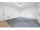 Finished basement with gray carpeting and plenty of storage at 1229 Whitlock Ridge Sw Dr, Marietta, GA 30064