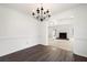 Bright dining room with hardwood floors and view into living room at 1229 Whitlock Ridge Sw Dr, Marietta, GA 30064