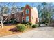 Brick townhouse with a charming front yard and driveway at 1229 Whitlock Ridge Sw Dr, Marietta, GA 30064