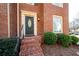 Welcoming front entrance with brick steps and landscaping at 1229 Whitlock Ridge Sw Dr, Marietta, GA 30064