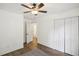 Spacious bedroom with an adjacent bathroom and double doors at 3980 Carlton Cove Ct, Loganville, GA 30052