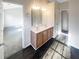 Bathroom with double vanity and dark flooring at 4154 Magnolia Glen Walk, Norcross, GA 30093