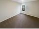 Well-lit bedroom with carpet and a window at 4154 Magnolia Glen Walk, Norcross, GA 30093