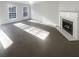 Bright living room with fireplace and carpet flooring at 4154 Magnolia Glen Walk, Norcross, GA 30093