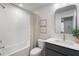 Clean bathroom with white subway tile and gray vanity at 425 Firefly Cir # 42, Alpharetta, GA 30009