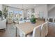 Elegant dining area with hardwood floors and a large table for entertaining at 425 Firefly Cir # 42, Alpharetta, GA 30009