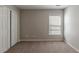 Simple bedroom with closet and window at 7336 Toccoa Cir, Union City, GA 30291