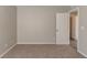 Well lit bedroom with carpet and access to bathroom at 7336 Toccoa Cir, Union City, GA 30291