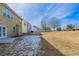 Backyard view of two-story house, and side yard at 7336 Toccoa Cir, Union City, GA 30291