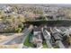 Aerial view of house and neighborhood, highlighting the pool at 1043 Belmont Commons Dr, Smyrna, GA 30080