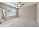 Well-lit bedroom with large window, ceiling fan and ample closet space at 1043 Belmont Commons Dr, Smyrna, GA 30080