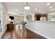 Open concept Gathering room featuring hardwood floors and a fireplace at 1043 Belmont Commons Dr, Smyrna, GA 30080