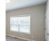 Simple bedroom with neutral wall paint and window blinds at 115 Oakdale Way, Temple, GA 30179