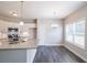 Kitchen with granite countertops and stainless steel appliances at 115 Oakdale Way, Temple, GA 30179