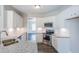 Modern kitchen with granite countertops and white cabinets at 115 Oakdale Way, Temple, GA 30179