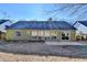 House exterior showcasing a patio and grassy backyard at 175 Paris Dr, Lawrenceville, GA 30043