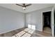 Bright bedroom with wood-look floors and ceiling fan at 175 Paris Dr, Lawrenceville, GA 30043