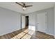 Spacious bedroom featuring wood-look floors and ceiling fan at 175 Paris Dr, Lawrenceville, GA 30043