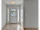 Bright entryway with tile flooring and neutral-toned walls at 175 Paris Dr, Lawrenceville, GA 30043