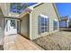 House exterior showcasing a side entrance and neat landscaping at 175 Paris Dr, Lawrenceville, GA 30043