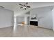 Open living area with tile flooring and a fireplace at 175 Paris Dr, Lawrenceville, GA 30043