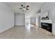 Living room with fireplace and access to other rooms at 175 Paris Dr, Lawrenceville, GA 30043