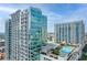 Modern high-rise residential building featuring a rooftop pool at 250 Pharr Ne Rd # 602, Atlanta, GA 30305