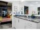 Modern bathroom with granite countertop and white cabinets at 250 Pharr Ne Rd # 602, Atlanta, GA 30305