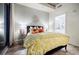 Bright bedroom with a queen bed and access to a private balcony at 250 Pharr Ne Rd # 602, Atlanta, GA 30305