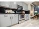 Modern kitchen with gray cabinets and stainless steel appliances at 250 Pharr Ne Rd # 602, Atlanta, GA 30305