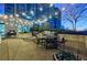 Outdoor patio with grill and string lights at 250 Pharr Ne Rd # 602, Atlanta, GA 30305