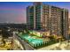 Rooftop pool with city skyline view at sunset at 250 Pharr Ne Rd # 602, Atlanta, GA 30305