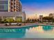 Relaxing resort-style pool with comfortable seating area at 250 Pharr Ne Rd # 602, Atlanta, GA 30305