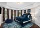 Primary bedroom with a luxurious bed and ample space at 580 Grimsby Ct, Suwanee, GA 30024