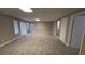 Finished basement with carpet and sliding doors at 710 Ridge Way, Lithonia, GA 30058