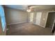 Spacious bedroom with neutral walls and carpet at 710 Ridge Way, Lithonia, GA 30058