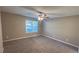 Spacious bedroom with neutral walls and carpet at 710 Ridge Way, Lithonia, GA 30058