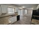 Eat-in kitchen with granite countertops and a view to the Gathering room at 710 Ridge Way, Lithonia, GA 30058