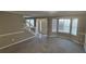 Bright living room featuring bay window and neutral decor at 710 Ridge Way, Lithonia, GA 30058