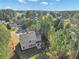 Aerial view of house showcasing backyard and surrounding trees at 116 Carriage Oak Dr, Villa Rica, GA 30180