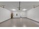 Spacious two-car garage with epoxy flooring and ample storage at 116 Carriage Oak Dr, Villa Rica, GA 30180