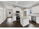 Modern kitchen with white cabinets, granite island, and stainless steel appliances at 116 Carriage Oak Dr, Villa Rica, GA 30180