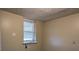 Small bedroom with window and closet. Needs some repair at 2531 Ridgecrest Nw Dr, Kennesaw, GA 30152